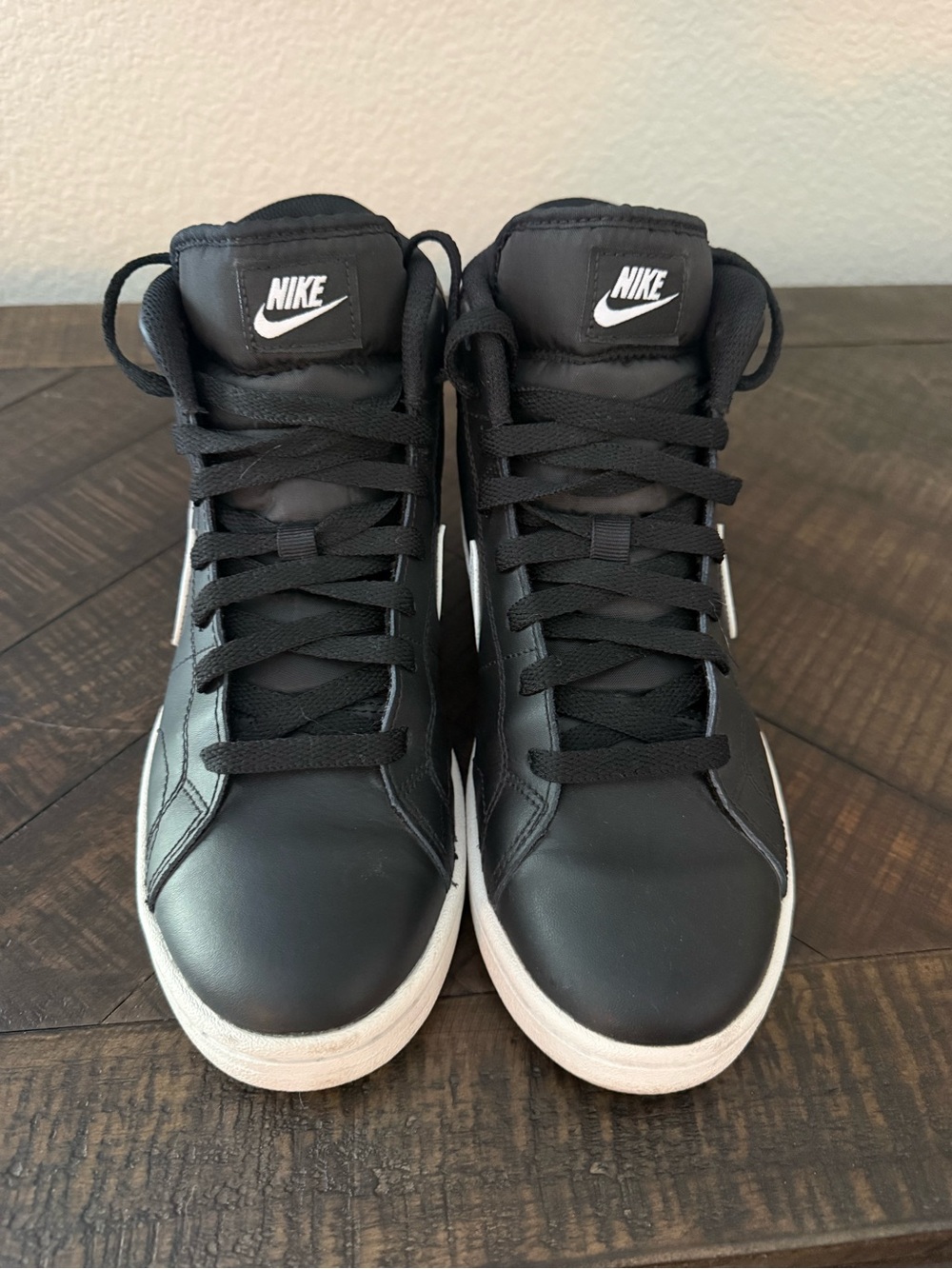 Nike Men’s Black and White Mid-Top Sneakers